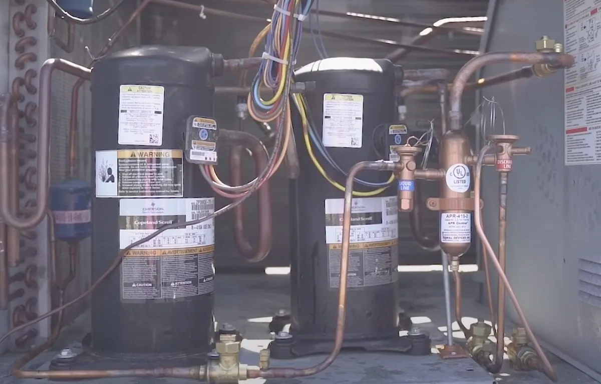 APR Control installed on a packaged rooftop unit, sized to the lead compressor